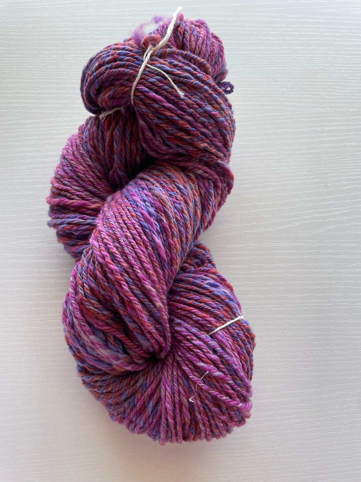 Handspun Merino Rambouillet wool blend yarn; 200 yds; Worsted weight - pink and purple colors