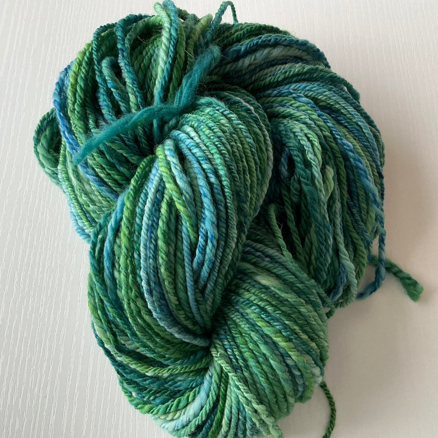 Handspun DK weight Yarn, 100% wool - dyed by Malabrigo - Solis - greens and blues