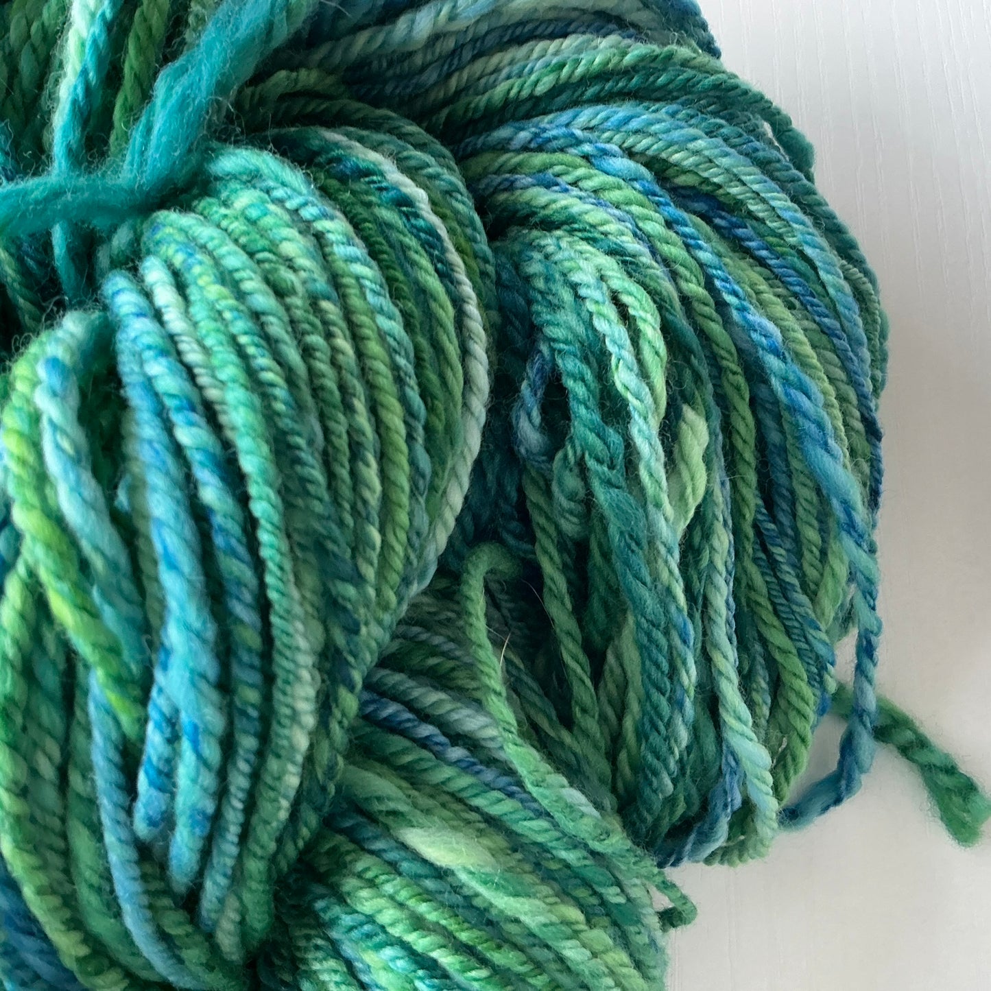 Handspun DK weight Yarn, 100% wool - dyed by Malabrigo - Solis - greens and blues