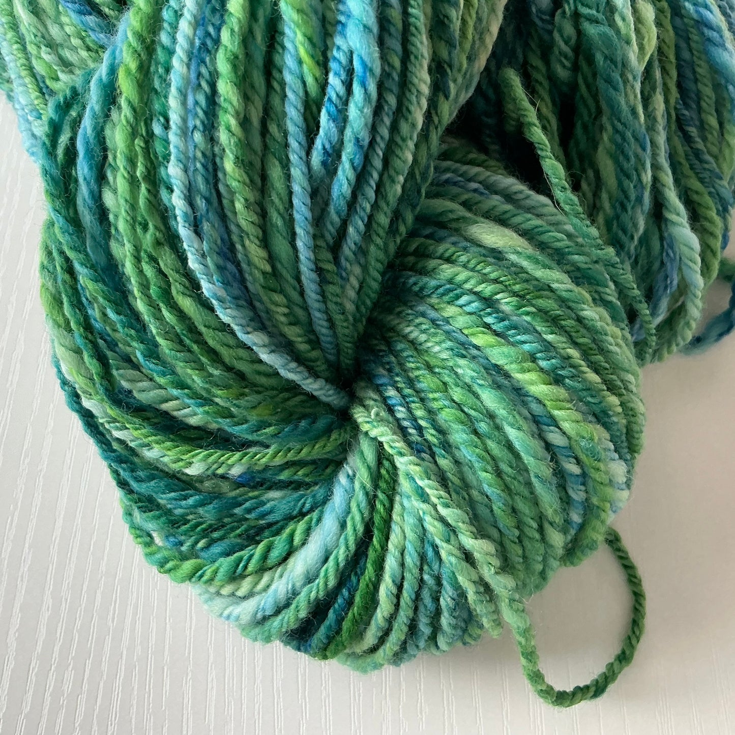 Handspun DK weight Yarn, 100% wool - dyed by Malabrigo - Solis - greens and blues